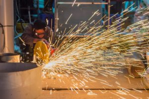 sparks flying in factory setting